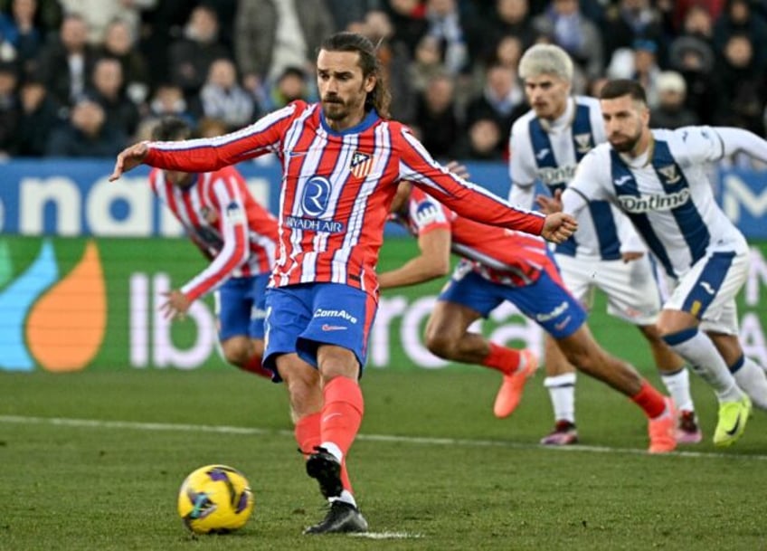 Atletico Madrid's French forward Antoine Griezmann missed a late penalty as his team fell