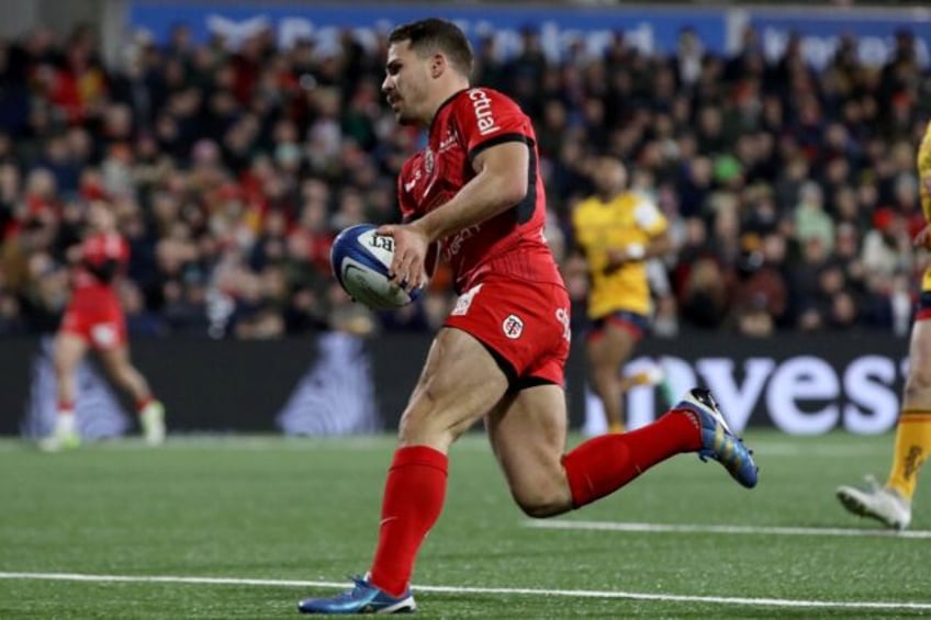 Man of the match: Toulouse's French scrum-half Antoine Dupont runs in his second try against Ulster