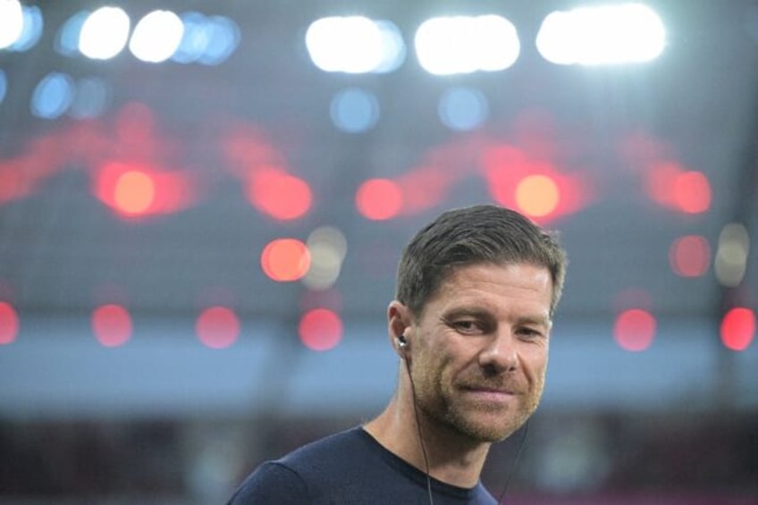 Bayer Leverkusen coach Xabi Alonso won the league and cup double in his first full season