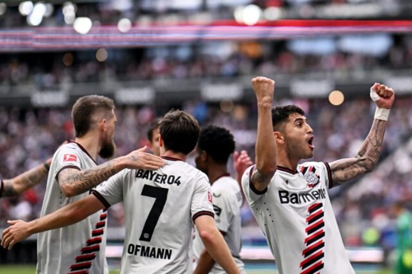 Exequiel Palacios celebrates scoring a penalty in Bayer Leverkusen's 5-1 win over Eintrach