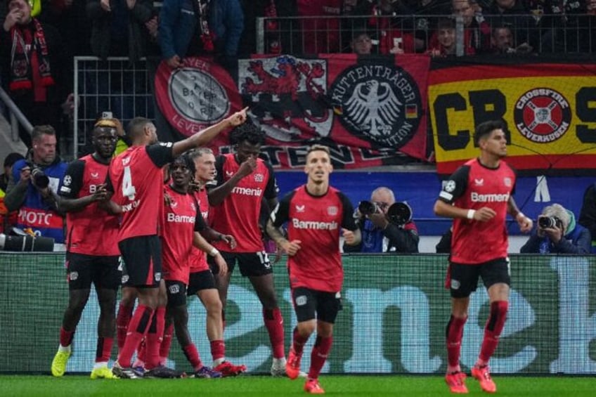 Victor Boniface (L) scored the winner for Bayer Leverkusen against AC Milan