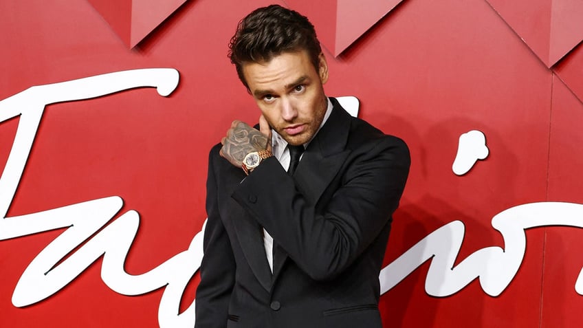 Liam Payne poses on the red carpet