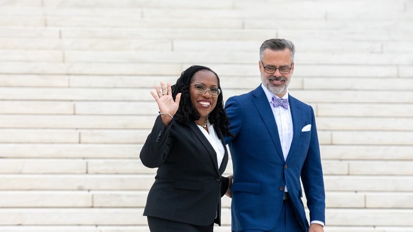 Ketanji Brown Jackson, associate justice of the U.S. Supreme Court, and husband Patrick Jackson on the front plaza of the Supreme Court building following an investiture ceremony in Washington, D.C., on Friday, Sept. 30, 2022.