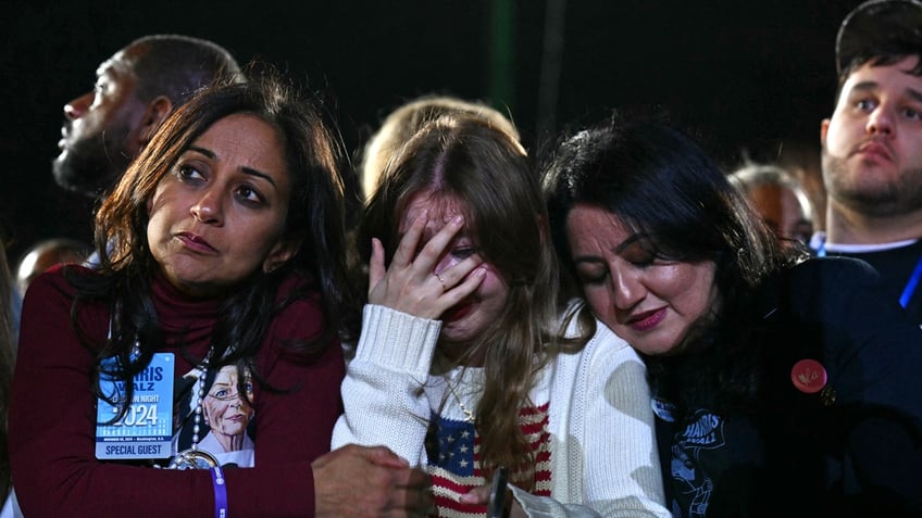 Supporters react to election results during an election night event for Vice President Kamala Harris at Howard University in Washington, DC, on November 5, 2024. 