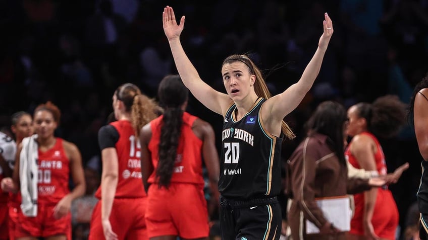 Sabrina Ionescu celebrates