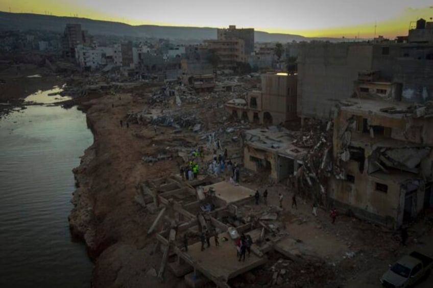 libya probes the collapse of two dams after flooding devastated an eastern city killing over 11000