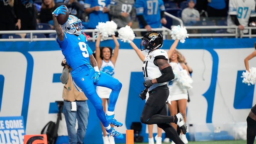 Jameson Williams celebrates touchdown