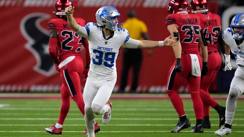Jake Bates runs off the field