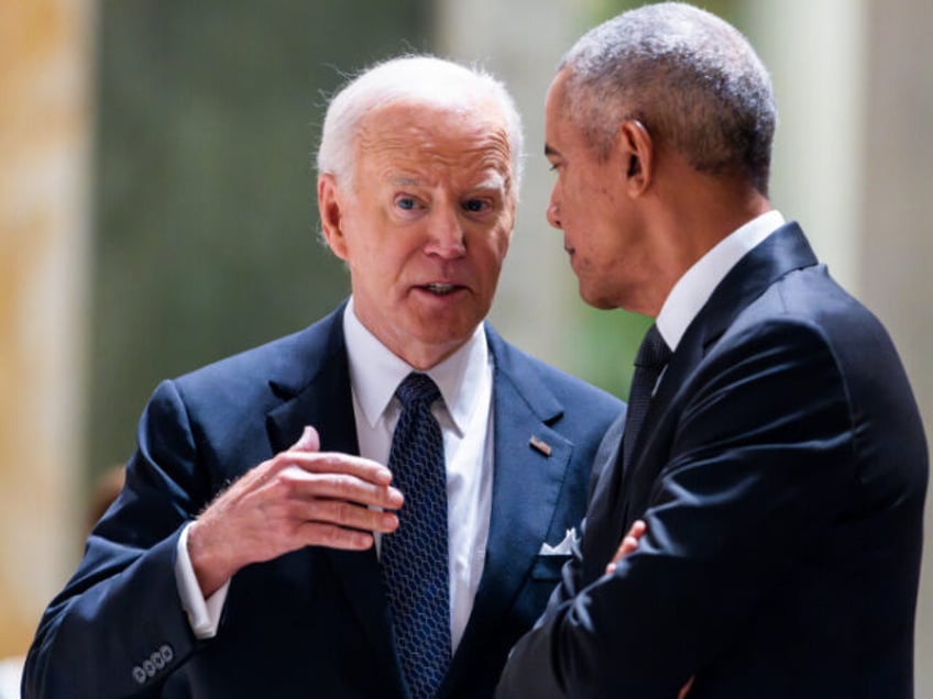 US President Joe Biden, left, and former US president Barack Obama during a memorial servi