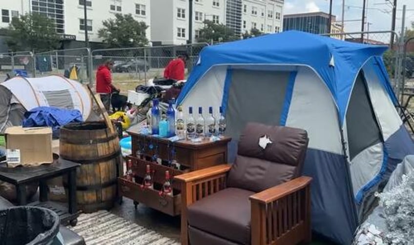 liquor in the front poker in the rear denver homeless camp busted for drinking prostitution