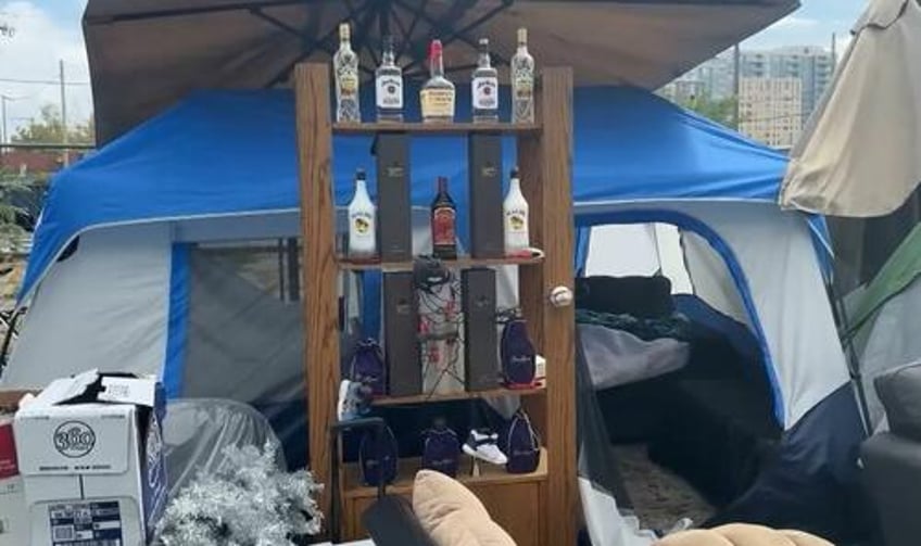 liquor in the front poker in the rear denver homeless camp busted for drinking prostitution