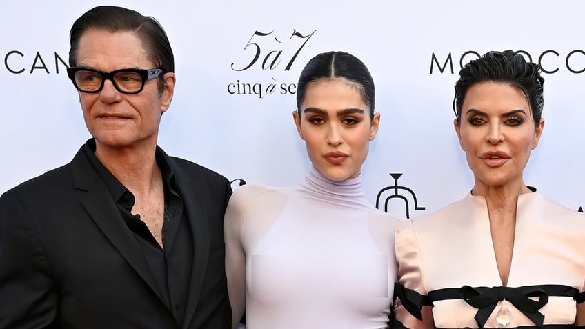 Harry Hamlin, Amelia Gray Hamlin, and Lisa Rinna posing together