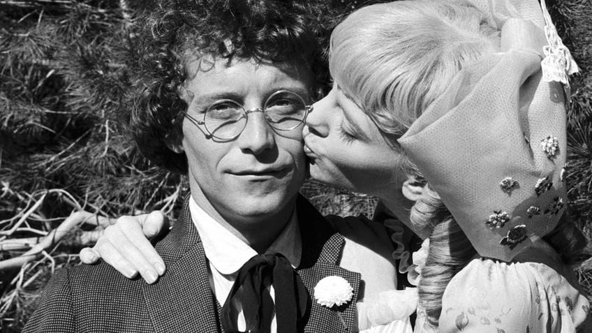 Alison Arngrim kissing Steve Tracy's cheek