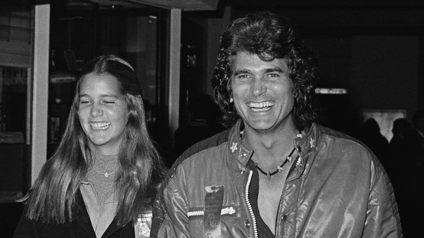 Michael Landon and Leslie Landon Matthews smiling next to each other.