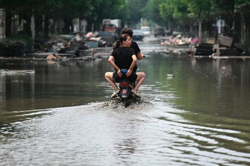 little warning and huge losses say china flood victims