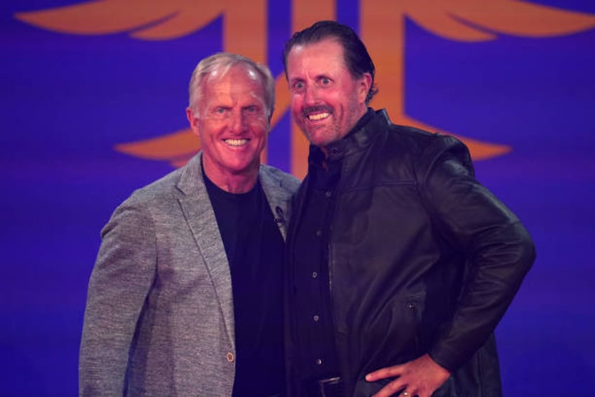 Greg Norman poses for a photograph with Phil Mickelson of the United States during the LIV Golf Invitational - London Draft on June 07, 2022 in...