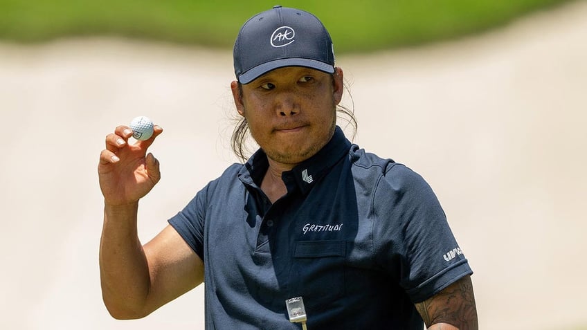 Anthony Kim at hole 8 in Singapore