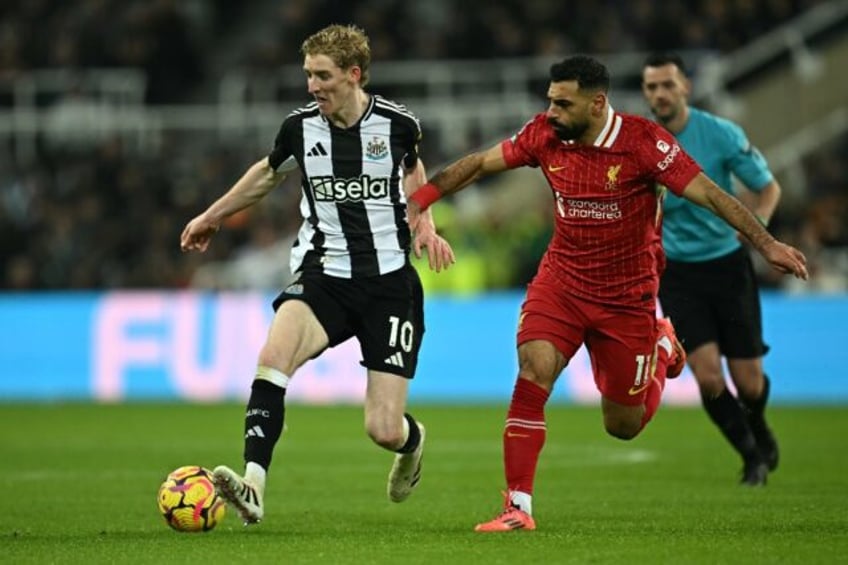 Liverpool's Mohamed Salah (R) scored twice in the draw at Newcastle