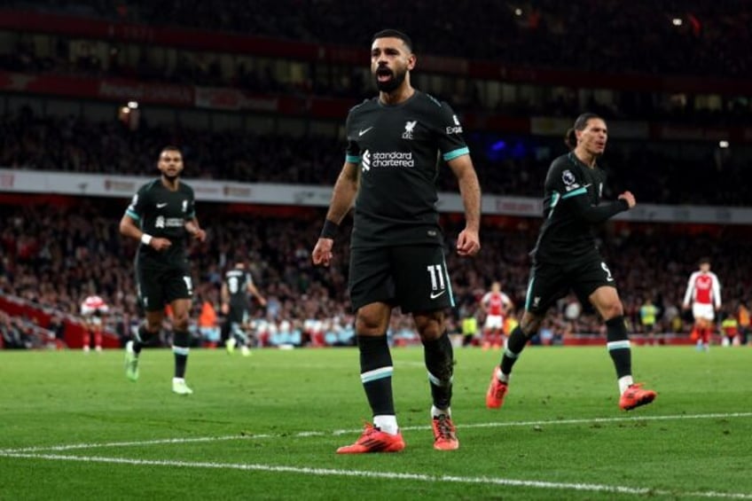 Liverpool's Mohamed Salah celebrates scoring against Arsenal