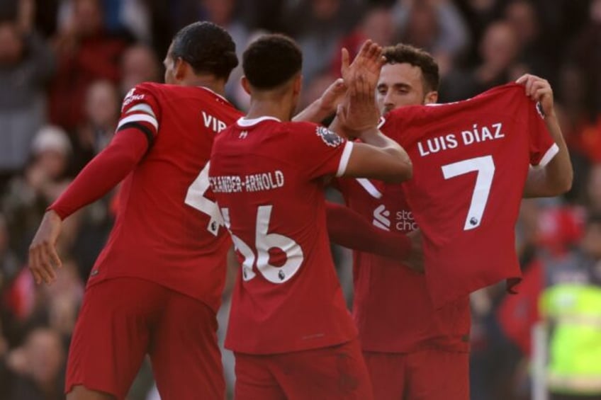 liverpool thump forest as villa extend premier league home run