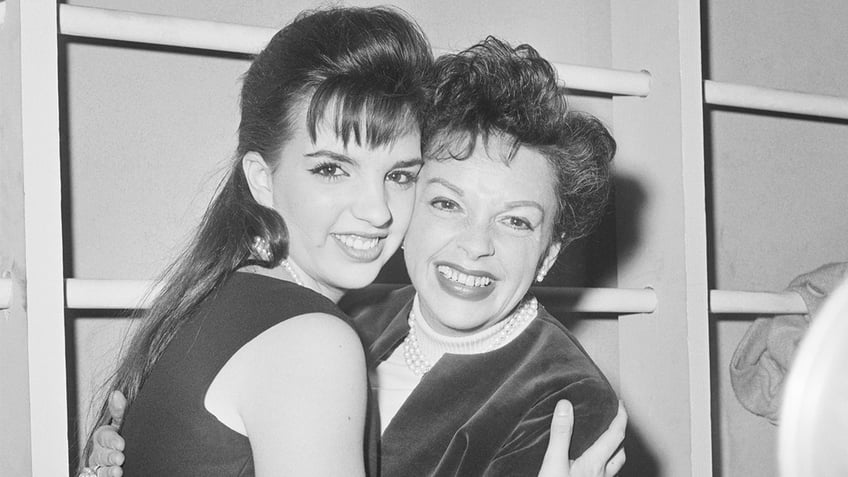 Judy Garland and Liza Minnelli share a hug