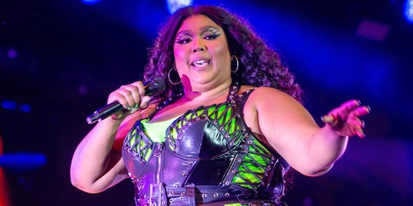 lizzo denies accusations of sexual harassment fat phobia by former dancers i am not the villain