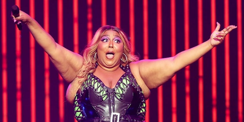 lizzo denies accusations of sexual harassment fat phobia by former dancers i am not the villain