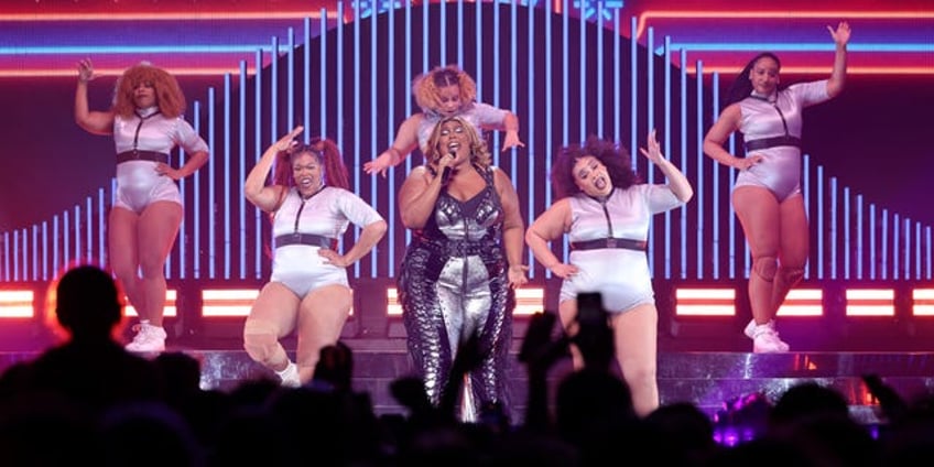 lizzo denies accusations of sexual harassment fat phobia by former dancers i am not the villain