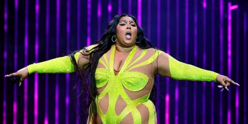 lizzo denies accusations of sexual harassment fat phobia by former dancers i am not the villain