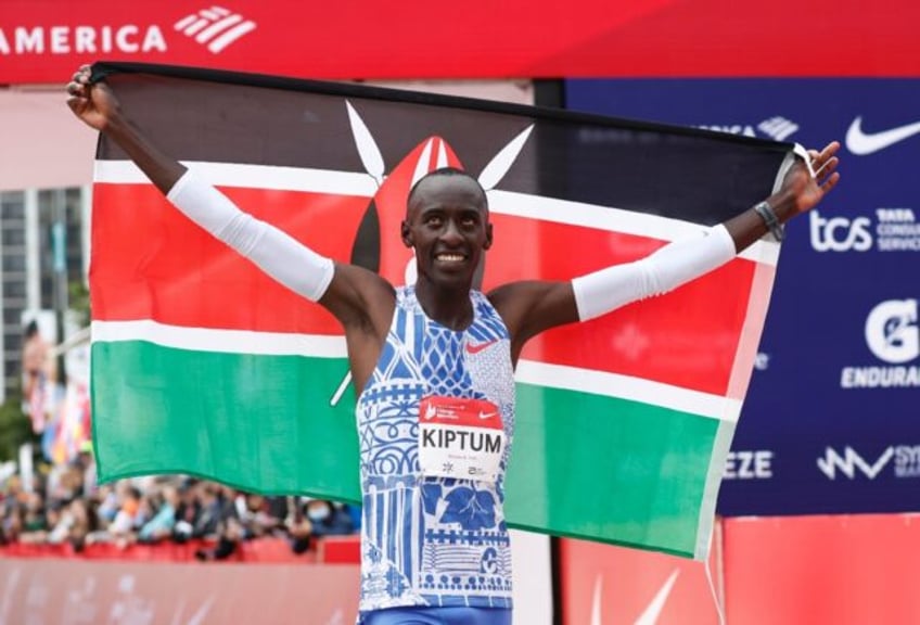 Kenya's Kelvin Kiptum won the Chicago Marathon in a world record time of two hours and 35