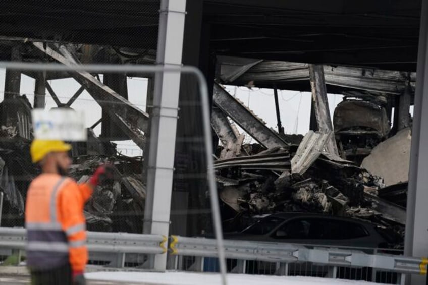 londons luton airport reopens after major disruption caused by a parking garage fire