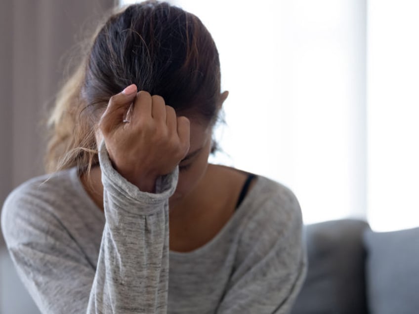 Depressed upset woman feeling hurt sad stressed troubled with problem - stock photo Depres