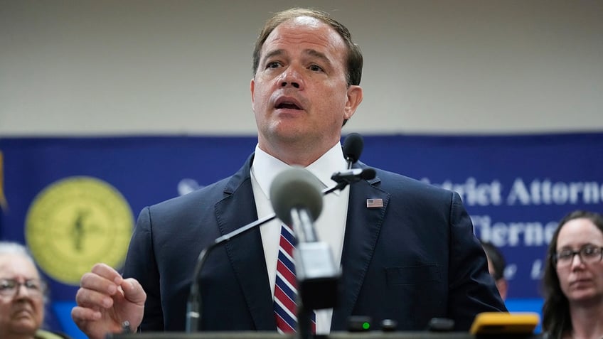 Suffolk County District Attorney Ray Tierney speaks to reporters during a news conference