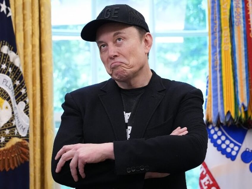 Elon Musk makes a goofy face