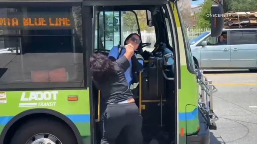 suspect punching and pulling bus driver