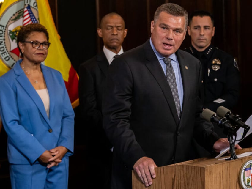 LOS ANGELES, CA - AUGUST 17: Deputy Chief LAPD Kris Pitcher, task force in-charge, flanked