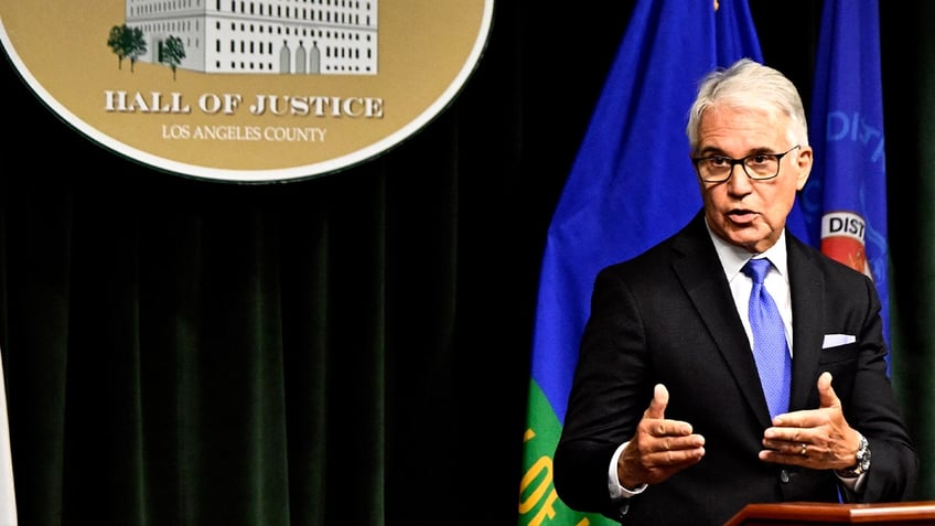 George Gascon speaks at lectern
