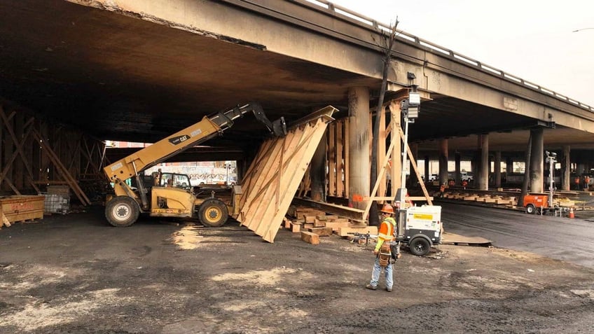 los angeles freeway that was damaged by arson will reopen by tuesday gov newsom says