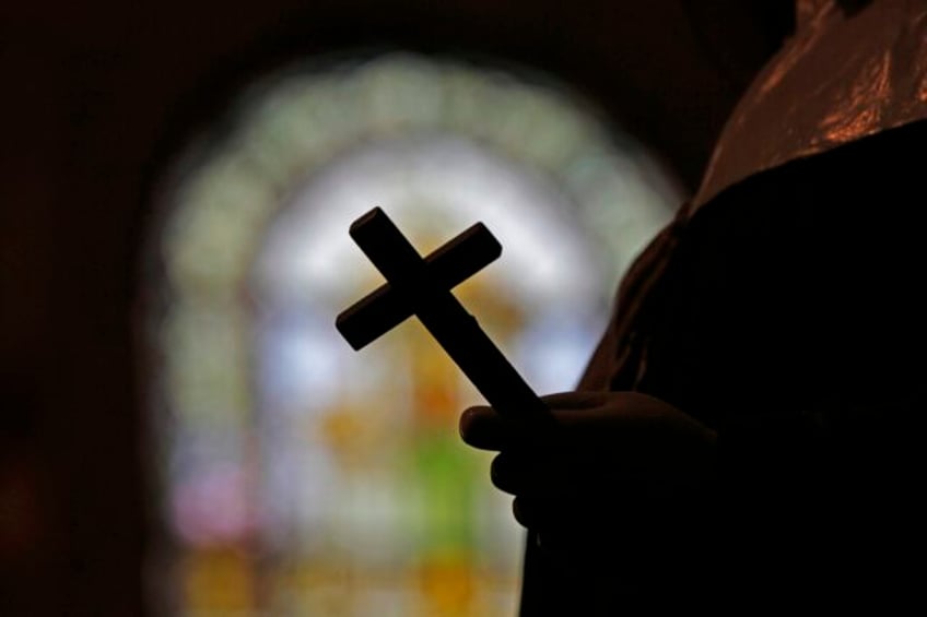 louisiana grand jury charges 91 year old disgraced priest with sexual assault of teenage boy in 1975