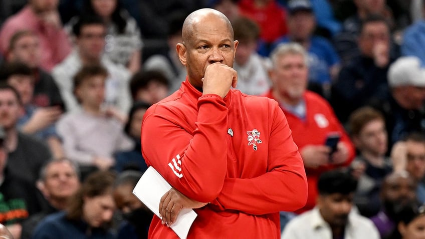 Kenny Payne watches courtside