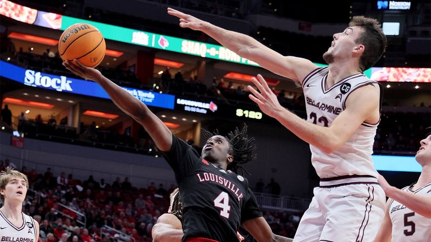 louisville freshman barely plays in first half due to not having tights that he wanted coach says