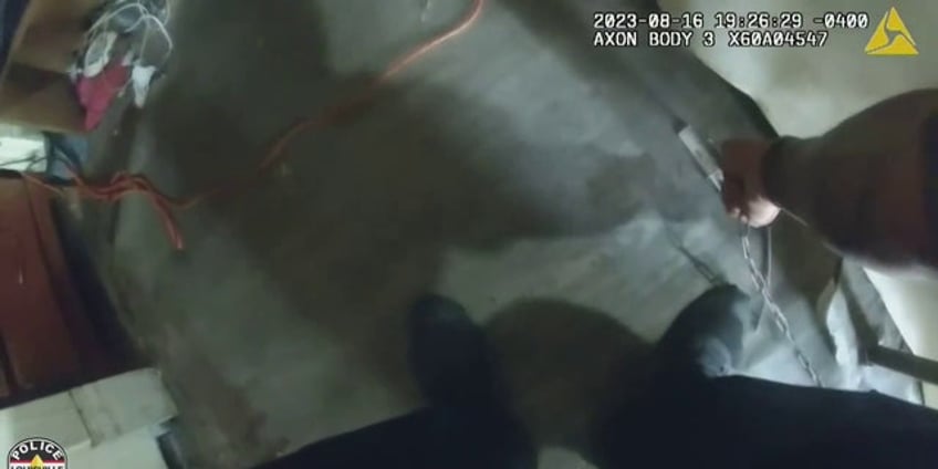 louisville police rescue captive woman chained to floor of home in dramatic bodycam video