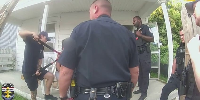 louisville police rescue captive woman chained to floor of home in dramatic bodycam video