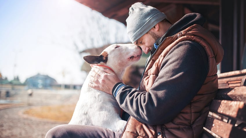 man with his dog