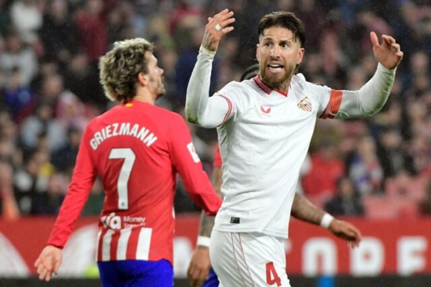 Sergio Ramos' (R) Sevilla defeated Atletico Madrid to string together two victories in a r