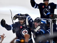Lowry scores late in 2OT to rally Jets to 4-3 win over Blues in Game 7 to advance to 2nd round