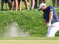 Lowry, Straka share lead at windy Truist