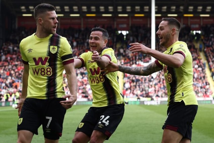 Johann Gudmundsson (left) rounded off Burnley's 4-1 win at Sheffield United