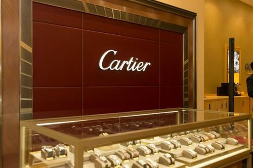 luxury group richemont plunges on signs of worsening us slowdown