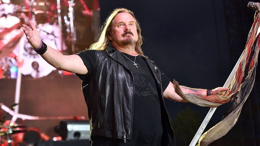 Johnny Van Zant performing on stage